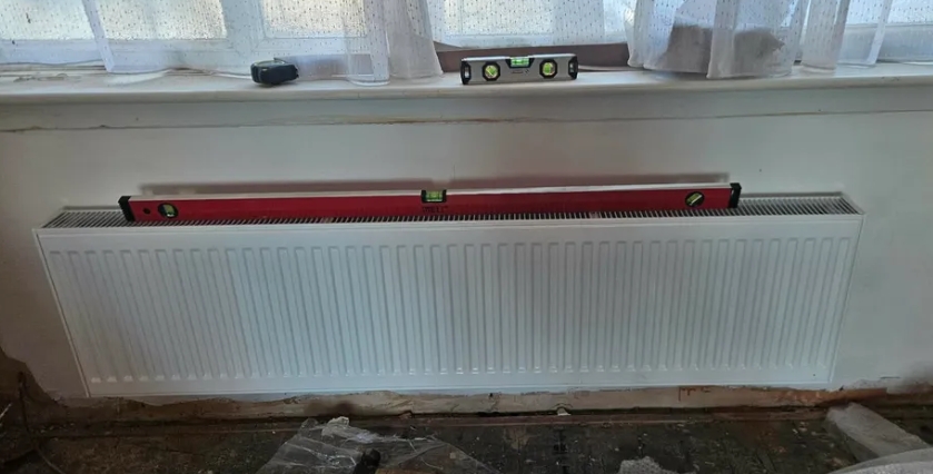 Radiator levelled and fitted